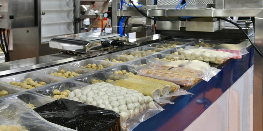 Automatic meatballs, pork, slices fresh meat, food production line on conveyor belt equipment machinery in factory